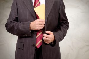 bribe in his pocket