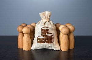 People gather around money bag. Financial support.